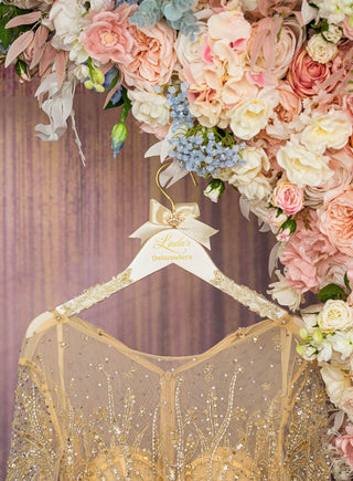 Gold quinceanera dress hanger