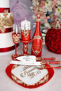 Red quinceanera brindis package with bottle and candle, dom perignon champagne bottle, shot caller bottles