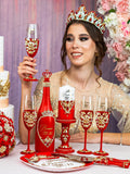 Red quinceanera brindis package with bottle and candle