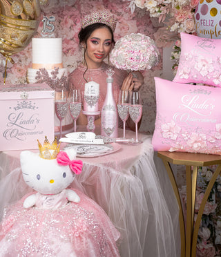 Pink quinceanera brindis package with bottle and candle