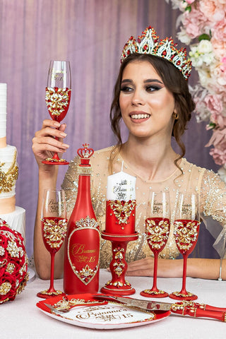 Red quinceanera brindis package with bottle and candle
