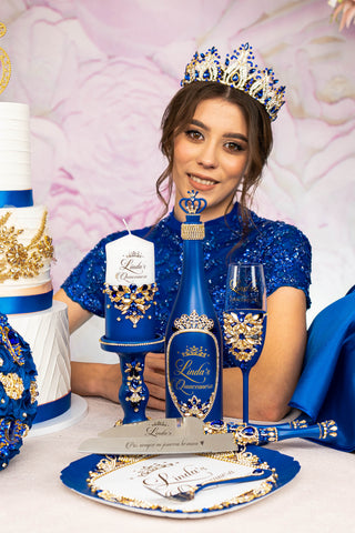 Royal blue brindis package with bottle and candle