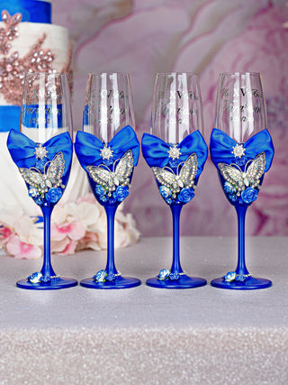 Royal blue with butterfly 4 quinceanera champagne glasses