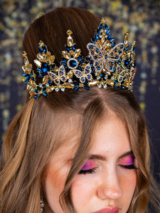 Navy blue with butterfly crown for quinceanera