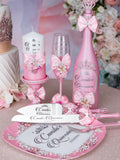 Pink quinceanera brindis package with bottle and candle