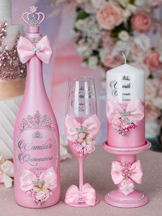 Pink quinceanera package of bottle, glass and candle