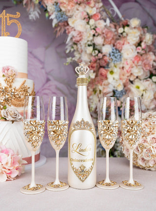 Gold quinceanera bottle with 4 glasses