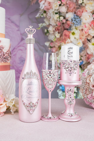 Pink quinceanera package of bottle, glass and candle